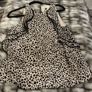 Beautiful print shell/tank with Flowy design.